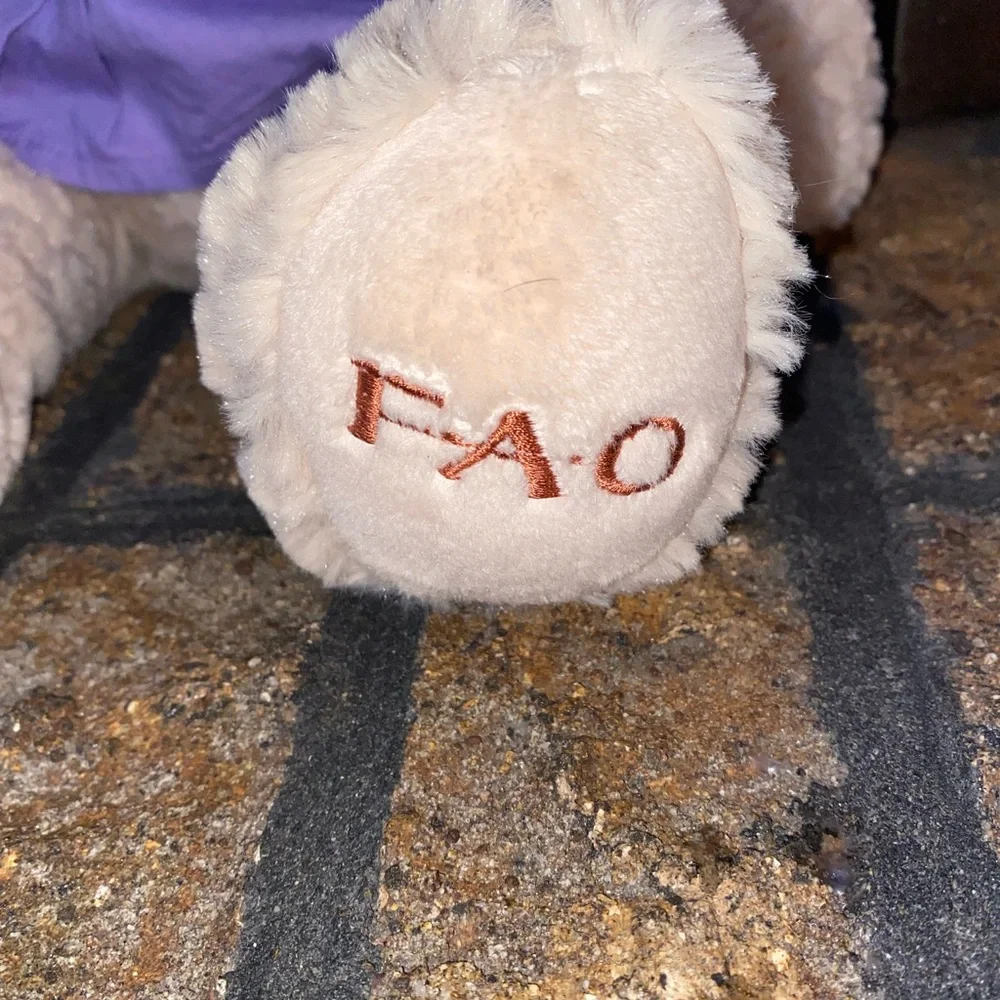 FAO Schwarz bear stuffed animal. 2016 Geoffrey, Purple dress and bow. - Picture 2 of 7